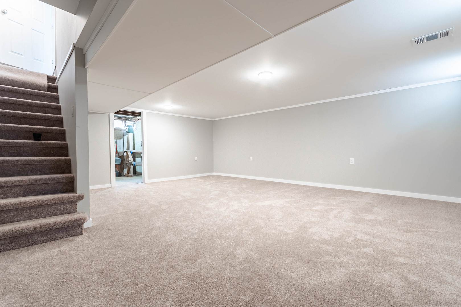 9515 Sumac Road, Unit F Des Plaines, IL 60016 - Photo 21 of 25 a view of an empty room with stairs