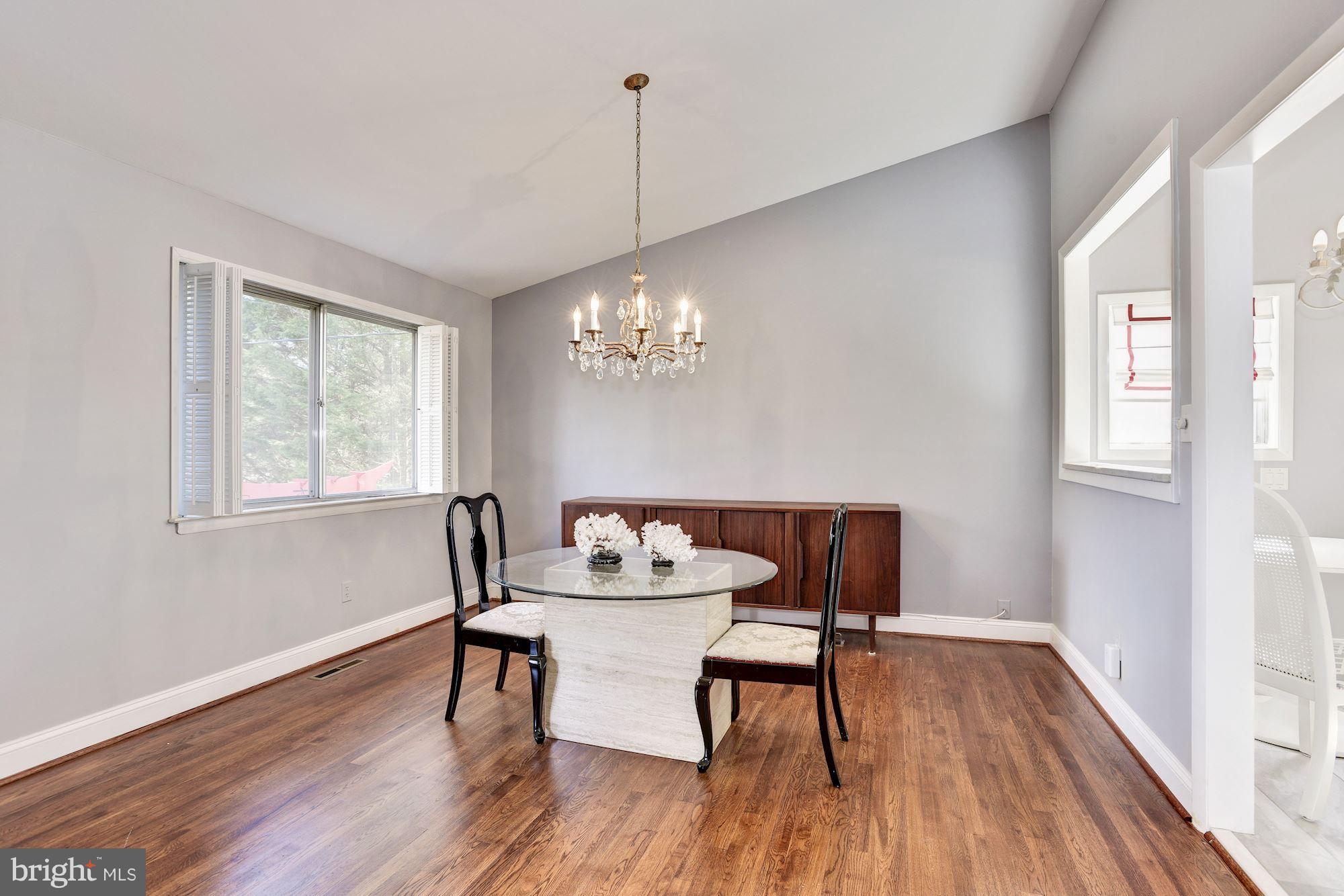 4614 Hawksbury Road Baltimore, MD 21208 - Photo 5 of 33 a dining room with furniture and window