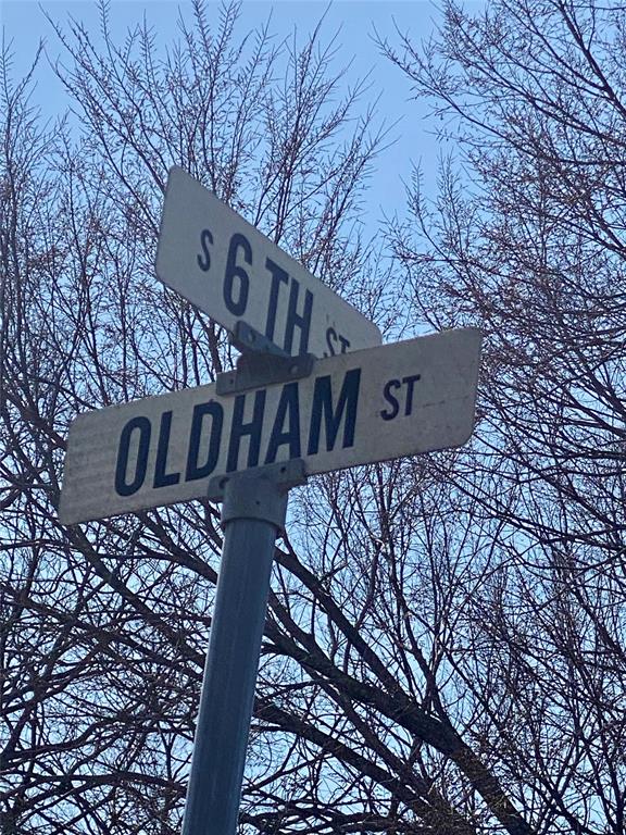 1115 South 6th Street Bonham, TX 75418 - Photo 23 of 23 a sign on the side of a building