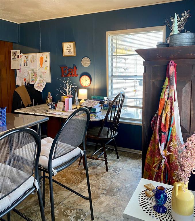 1115 South 6th Street Bonham, TX 75418 - Photo 8 of 23 a view of a dining room with furniture and a window