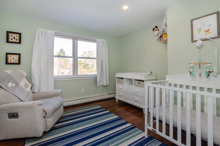 31 Captain Carleton's Road Cotuit, MA 02635 - Photo 16 of 32 a living room with furniture and a window