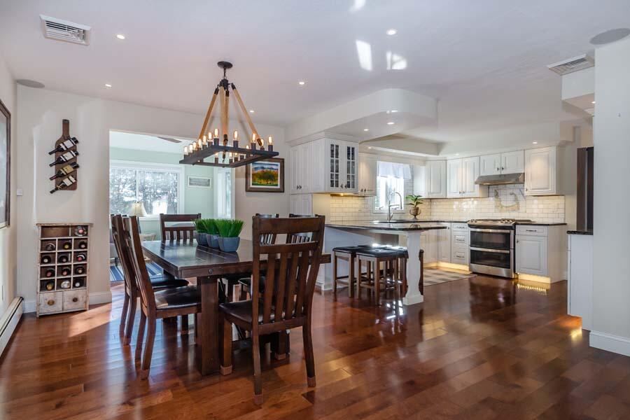 31 Captain Carleton's Road Cotuit, MA 02635 - Photo 2 of 32 a view of a dining room with furniture window and wooden floor
