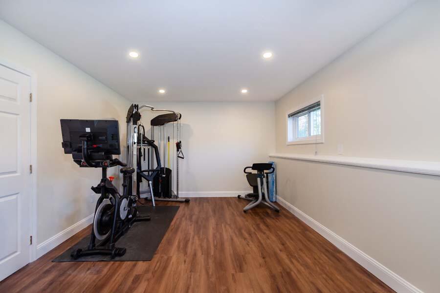 31 Captain Carleton's Road Cotuit, MA 02635 - Photo 21 of 32 a view of a room with gym equipment