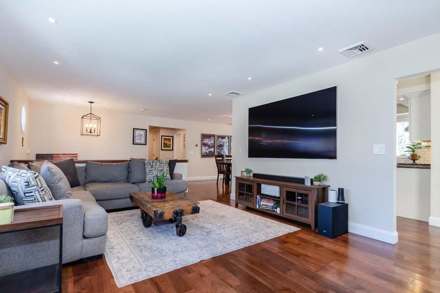 31 Captain Carleton's Road Cotuit, MA 02635 - Photo 3 of 32 a living room with furniture and a flat screen tv
