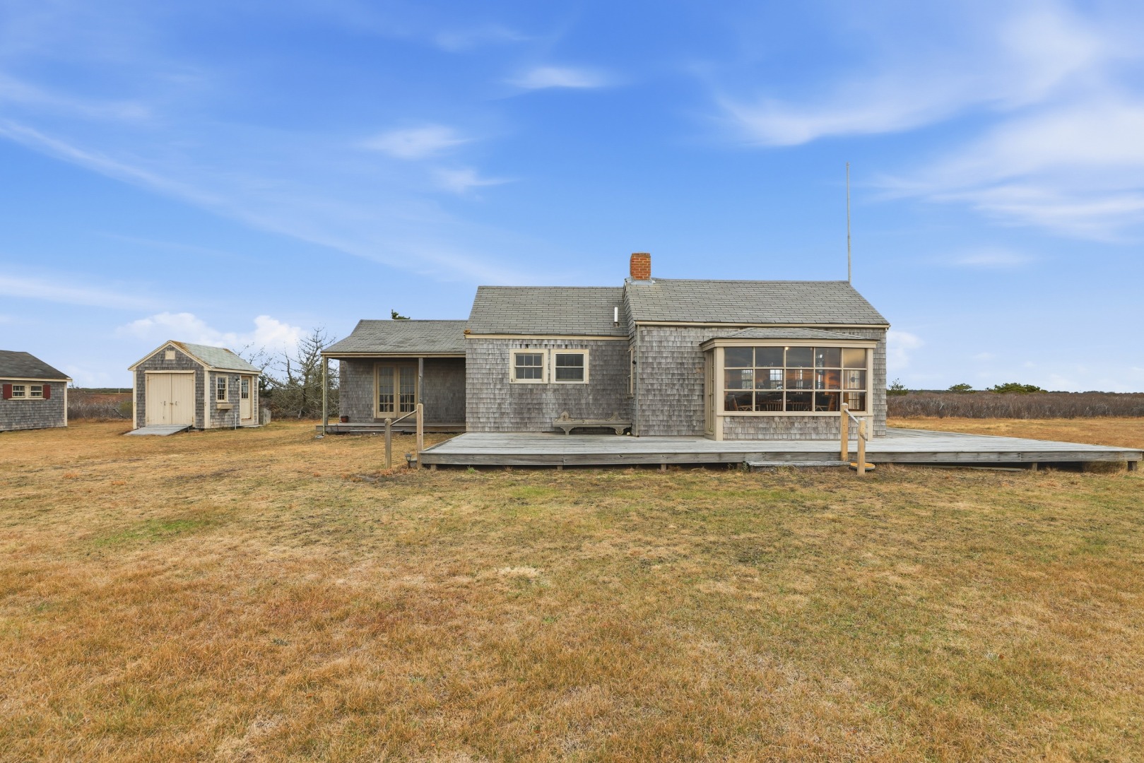 44 Madequecham Valley Road Nantucket, MA 02554 - Photo 13 of 19 a front view of a house with a yard