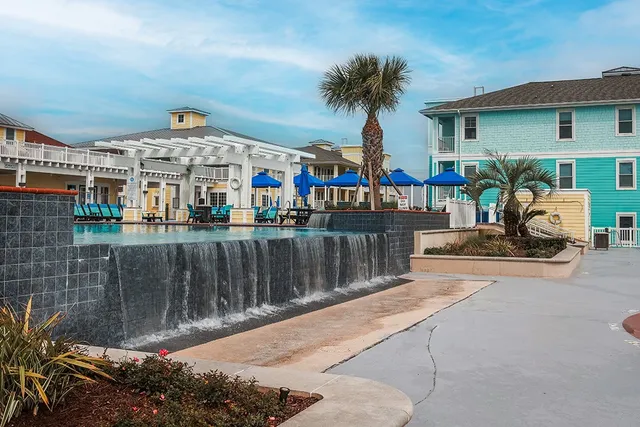 a view of a chairs and table in the patio