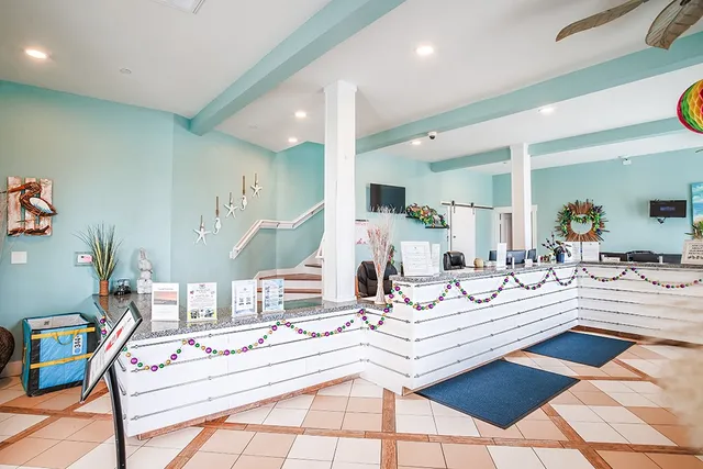 a kitchen with a dining table and chairs