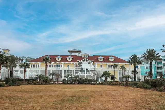 a front view of building with yard