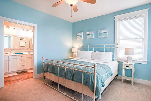 a bedroom with a bed and a cabinets