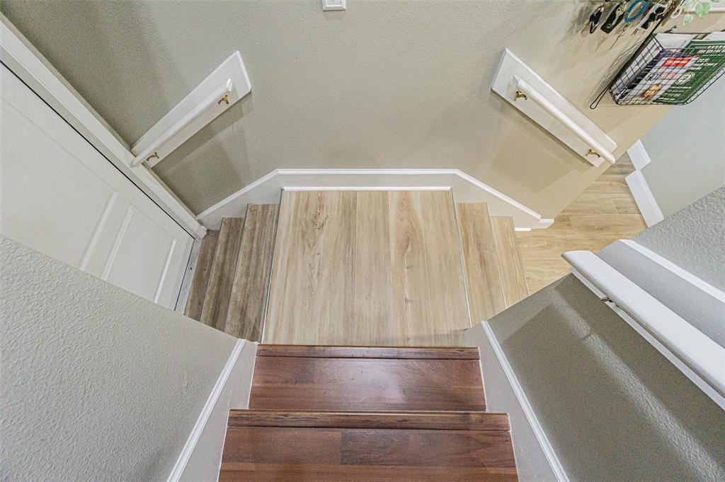 9809 La Rita Place Riverview, FL 33569 - Photo 28 of 59 a view of staircase with white walls and railing