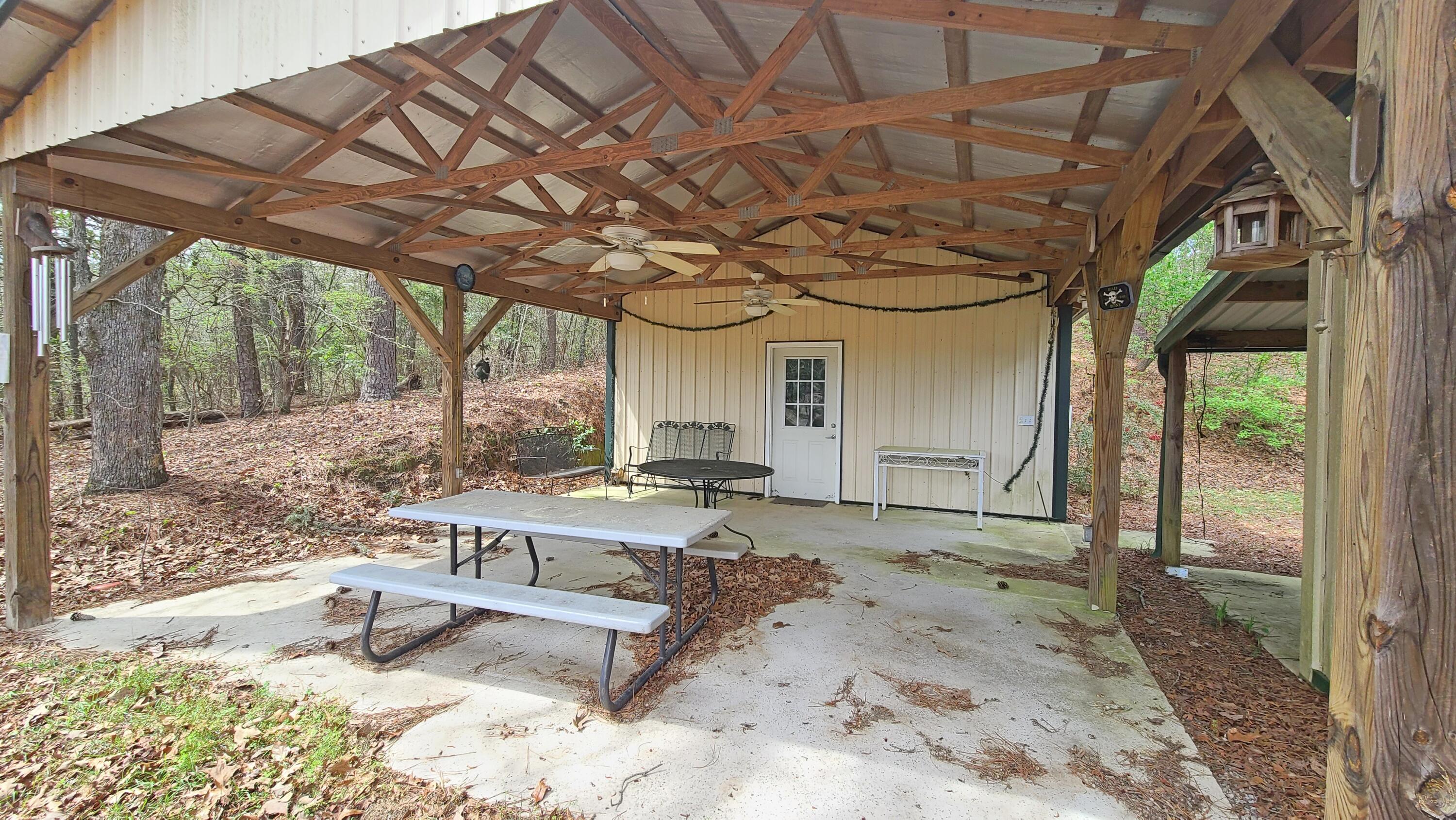 1086 Powell Pond Road Aiken, SC 29801 - Photo 51 of 66 Covered Outdoor Cookout Building with Storage Room