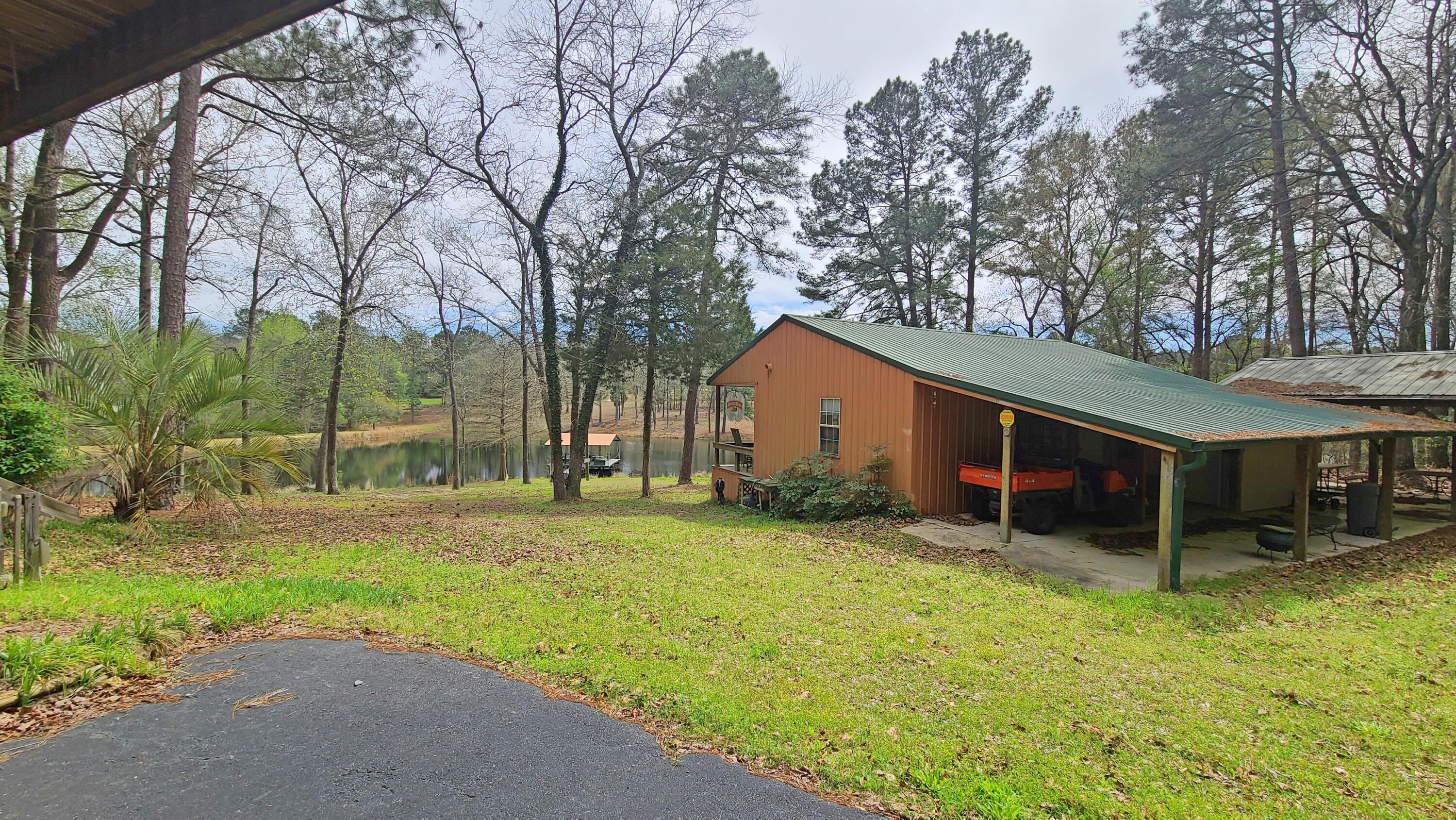 1086 Powell Pond Road Aiken, SC 29801 - Photo 54 of 66 Rear View of the Guest Cottage