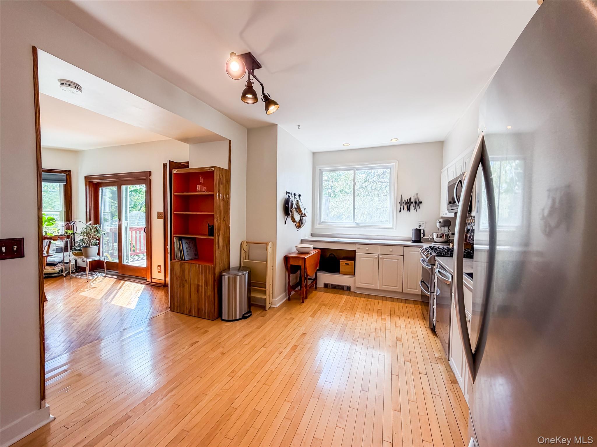 350 Smith Street Peekskill, NY 10566 - Photo 18 of 32 a view of a living room and a wooden floor
