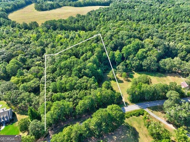 0 New Hope Church Road Monroe, GA 30656 - Photo 3 of 30 an aerial view of a house with a yard
