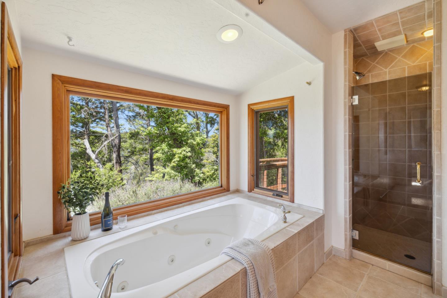 1495 Dons Road Boulder Creek, CA 95006 - Photo 15 of 40 a bath tub sitting in a bathroom next to a window