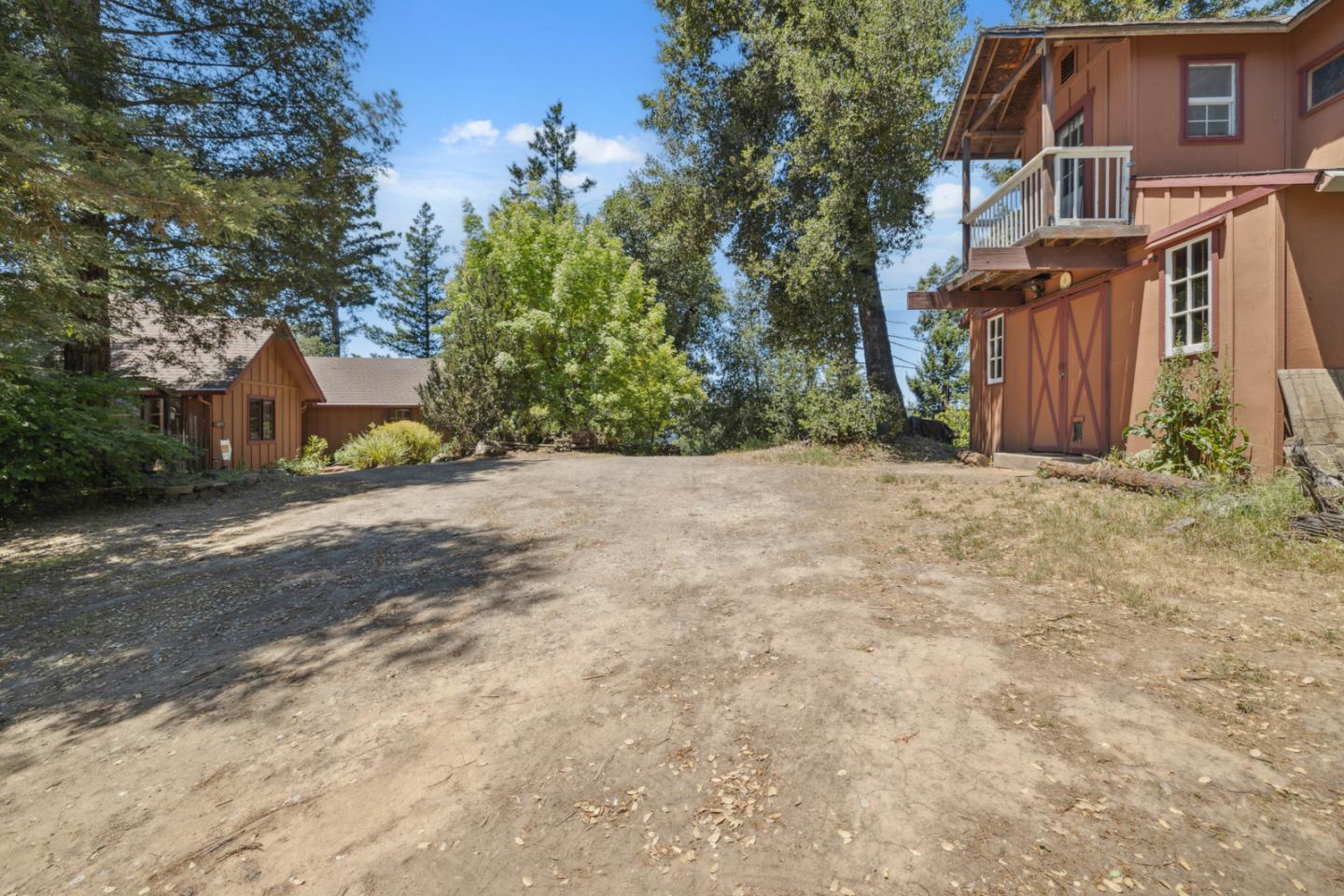 1495 Dons Road Boulder Creek, CA 95006 - Photo 21 of 40 a view of a house with a yard