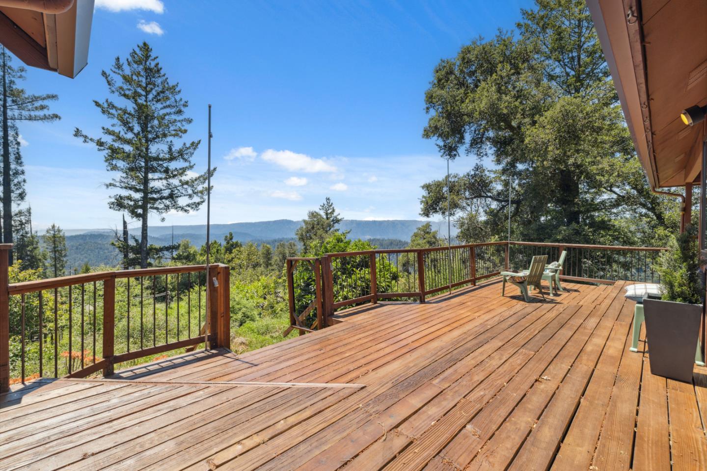 1495 Dons Road Boulder Creek, CA 95006 - Photo 4 of 33 a view of a balcony with wooden floor and fence