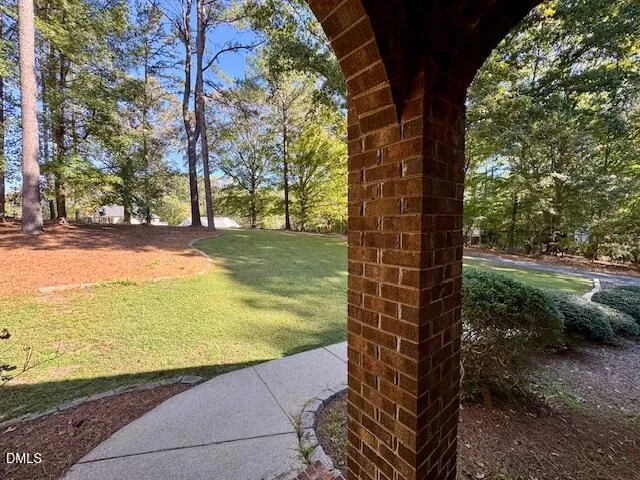 a view of a yard with an outdoor space
