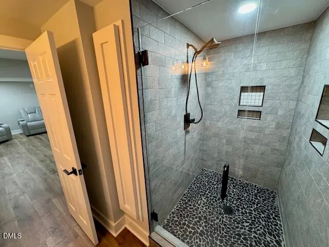 a view of an empty room with a window