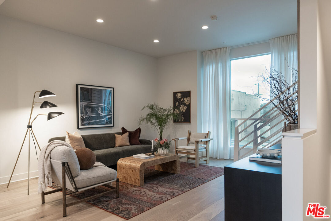 2210 Tom Mix Road Los Angeles, CA 90026 - Photo 16 of 45 a living room with furniture and a window
