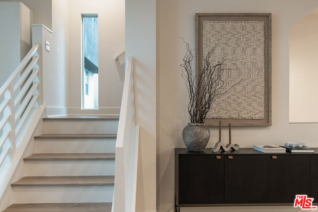 2210 Tom Mix Road Los Angeles, CA 90026 - Photo 17 of 45 a view of staircase with white walls