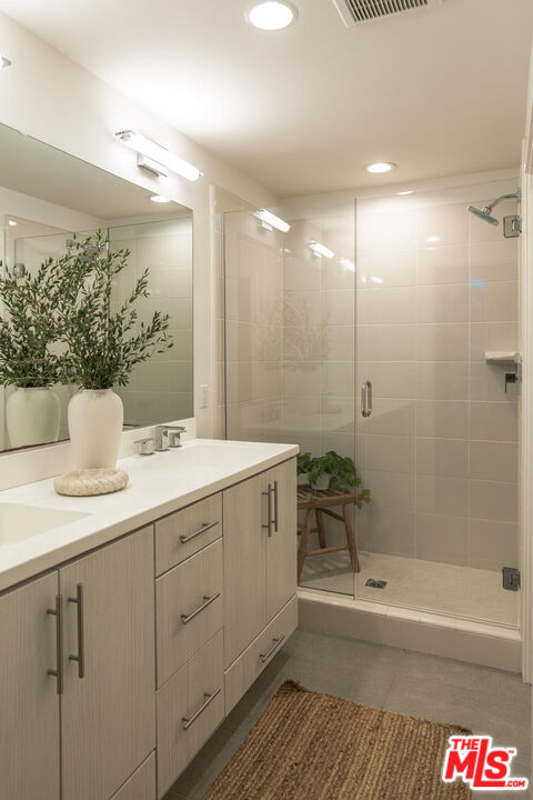 2210 Tom Mix Road Los Angeles, CA 90026 - Photo 25 of 45 a bathroom with a sink a toilet and shower