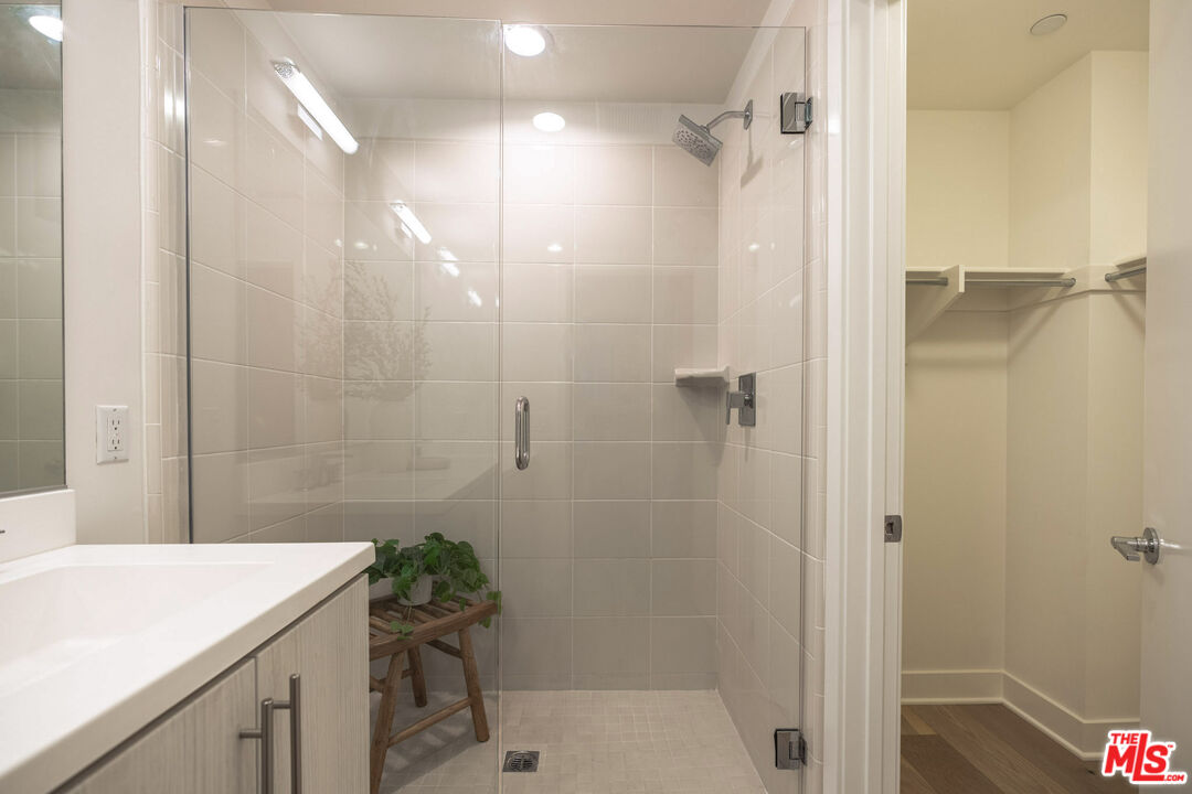 2210 Tom Mix Road Los Angeles, CA 90026 - Photo 26 of 45 a bathroom with a sink and shower