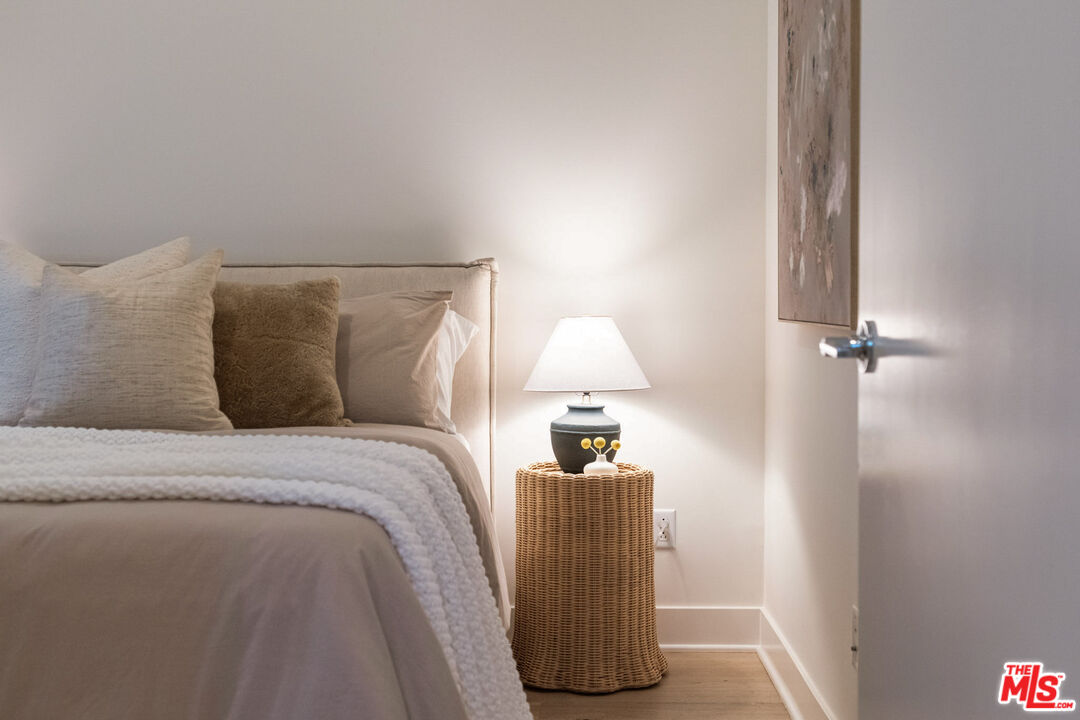 2210 Tom Mix Road Los Angeles, CA 90026 - Photo 31 of 45 a bed room with a bed and a night stand