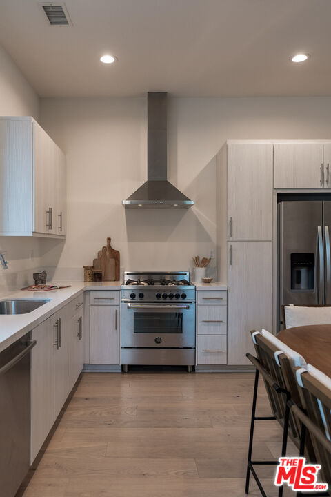 2210 Tom Mix Road Los Angeles, CA 90026 - Photo 4 of 45 a kitchen with a stove and a refrigerator
