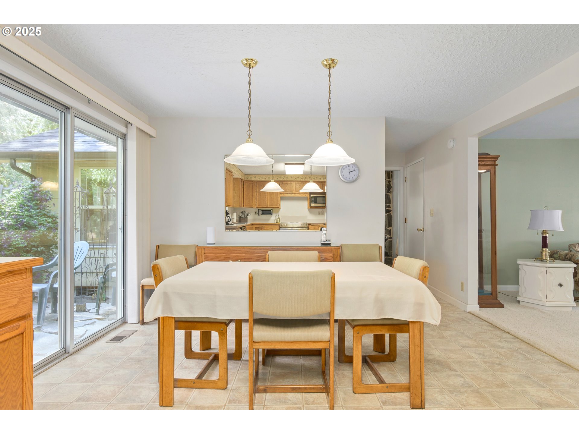 41886 Deerhorn Road Springfield, OR 97478 - Photo 13 of 48 a view of a dining room with furniture window and wooden floor