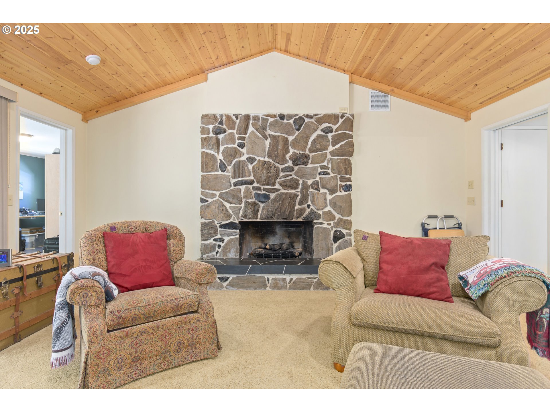 41886 Deerhorn Road Springfield, OR 97478 - Photo 21 of 48 a living room with furniture and a fireplace