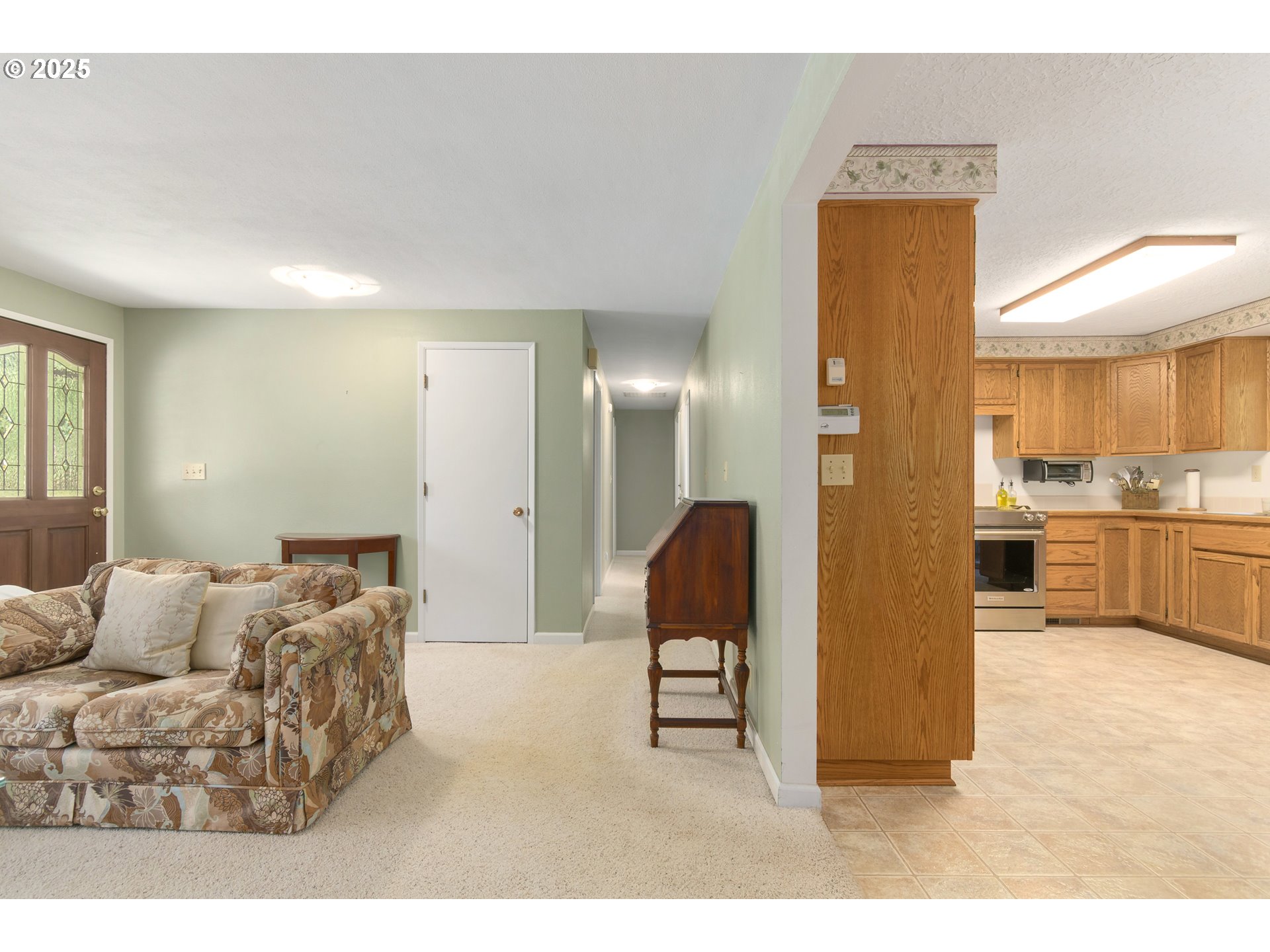41886 Deerhorn Road Springfield, OR 97478 - Photo 25 of 48 a living room with furniture and a dining table