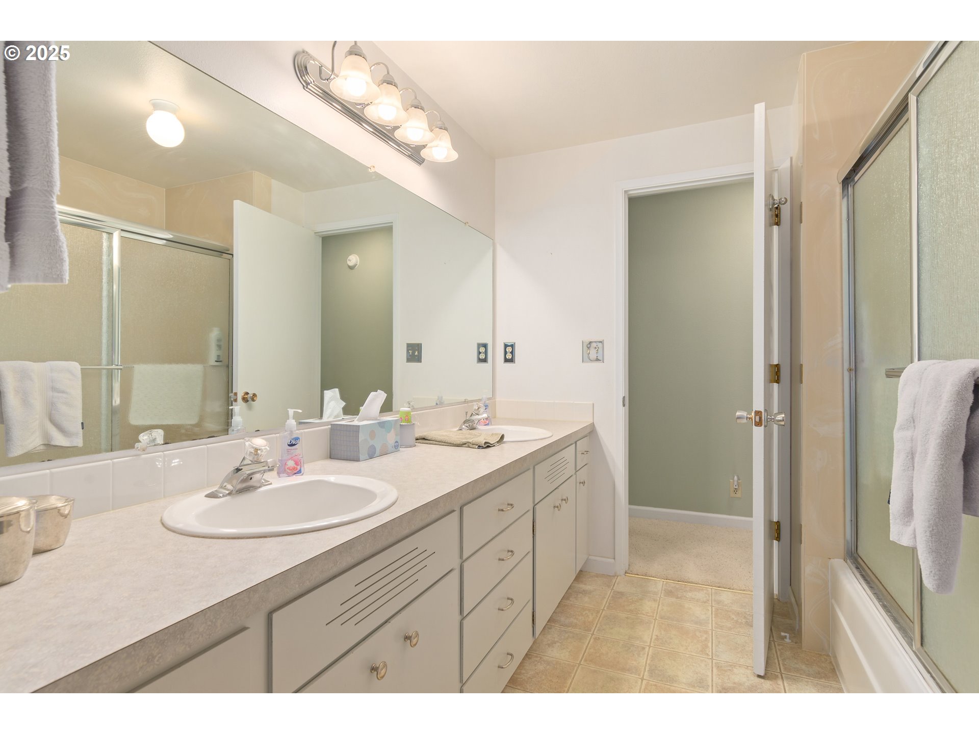 41886 Deerhorn Road Springfield, OR 97478 - Photo 28 of 48 a bathroom with a sink and a mirror