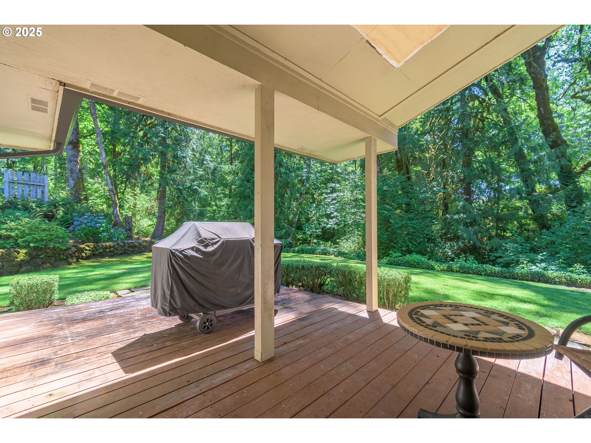 41886 Deerhorn Road Springfield, OR 97478 - Photo 35 of 48 a view of a porch with furniture and garden
