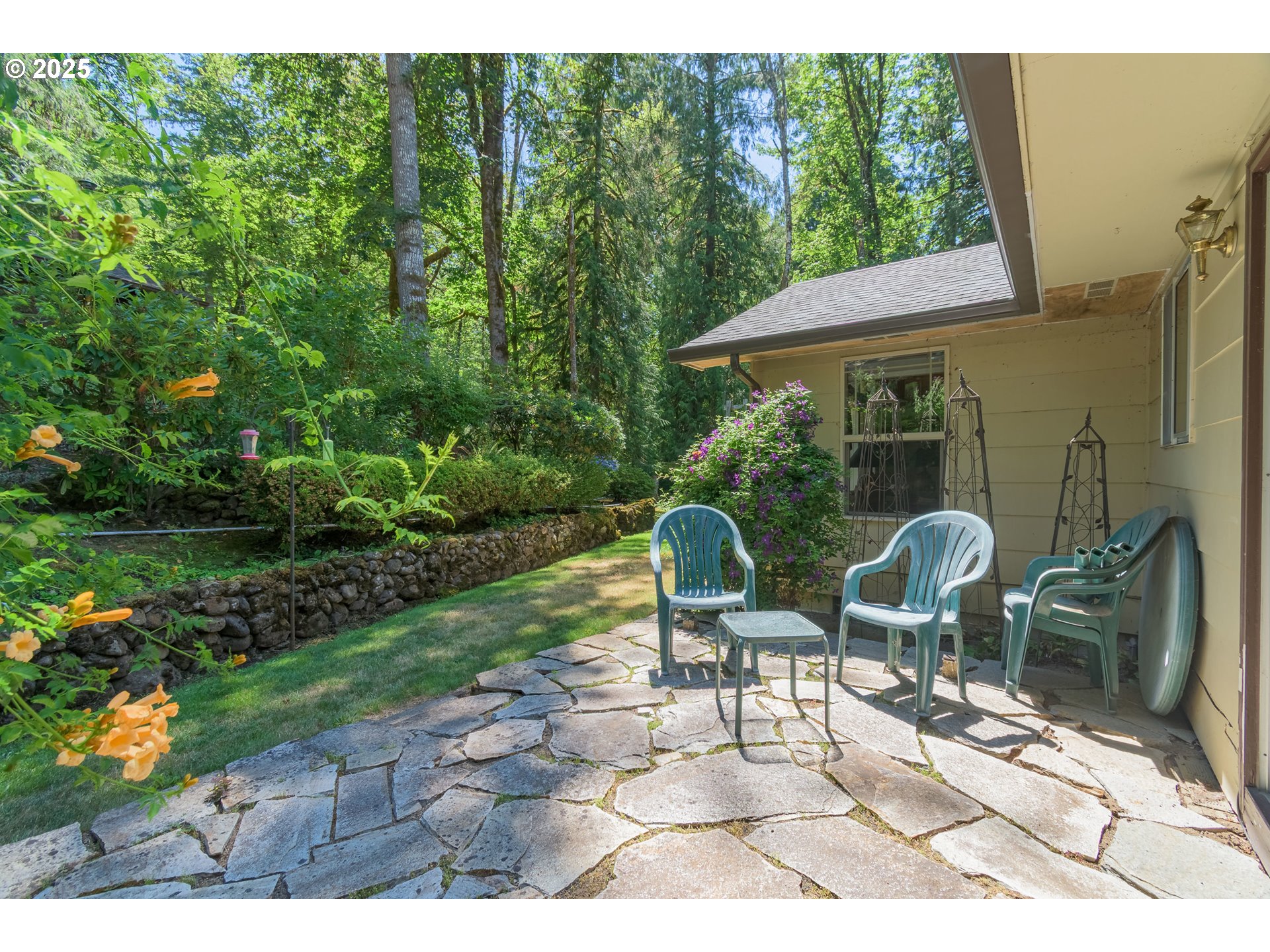 41886 Deerhorn Road Springfield, OR 97478 - Photo 43 of 48 a view of a patio with table and chairs and potted plants