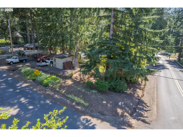 a view of a backyard with sitting area