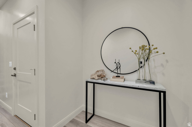 4016 South Burch Way Ogden, UT 84405 - Photo 2 of 30 Entryway featuring a solid panel door with contemporary hardware