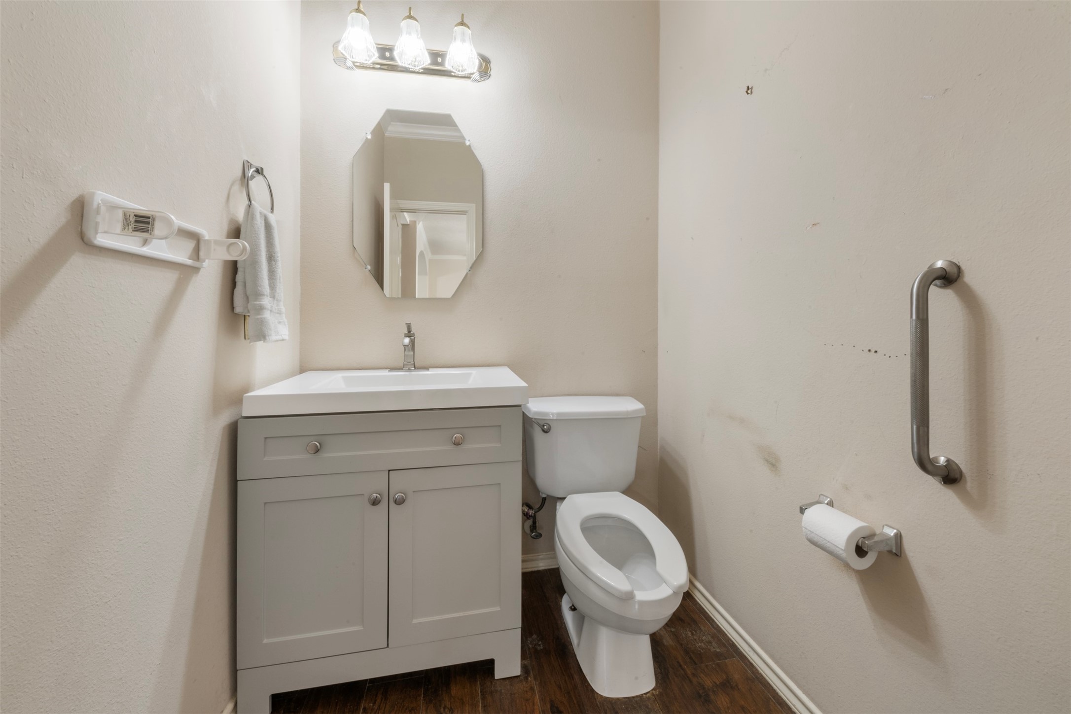 1839 Manor Drive Baytown, TX 77521 - Photo 15 of 26 a bathroom with a toilet sink and mirror