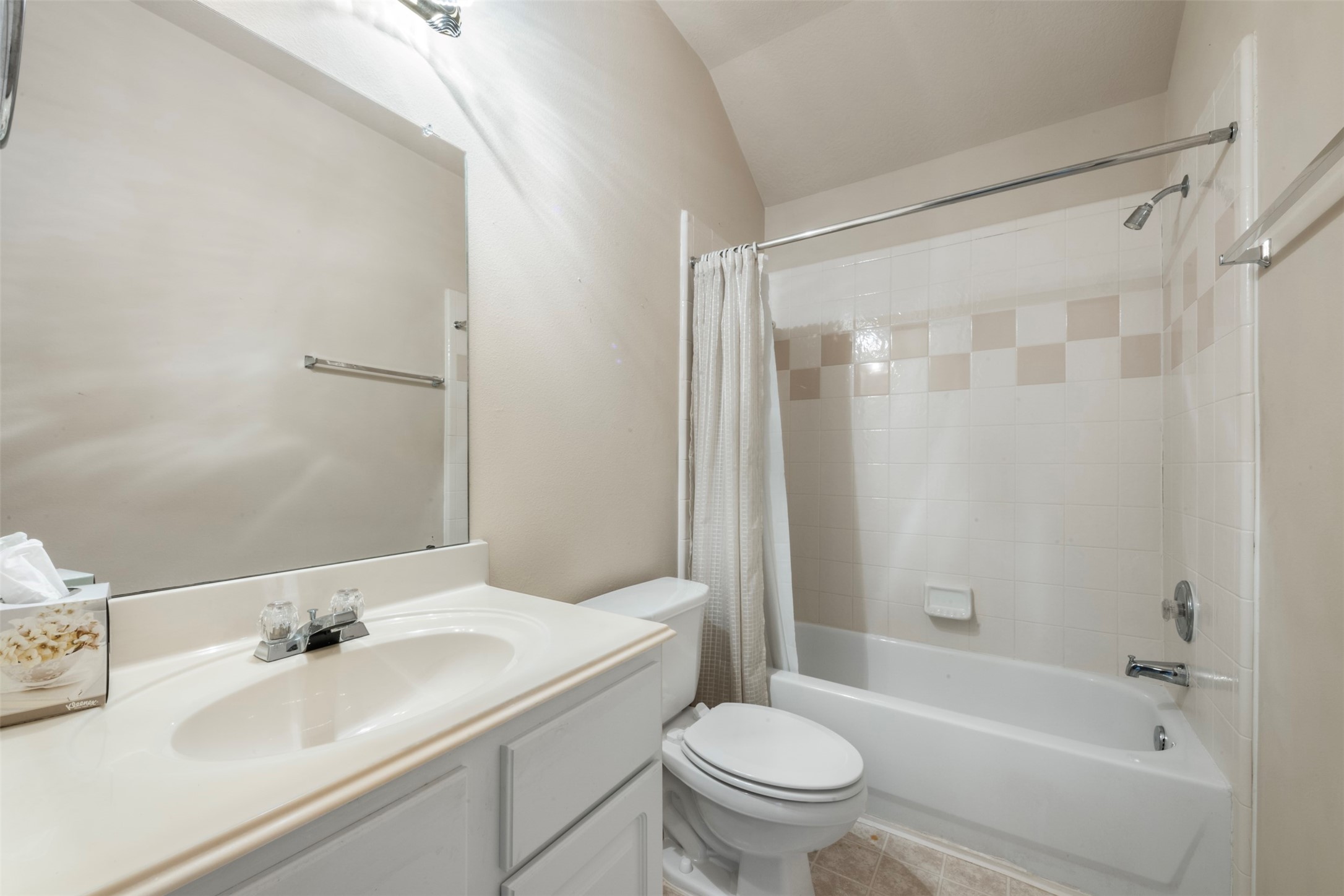 1839 Manor Drive Baytown, TX 77521 - Photo 17 of 26 a bathroom with a sink toilet and shower