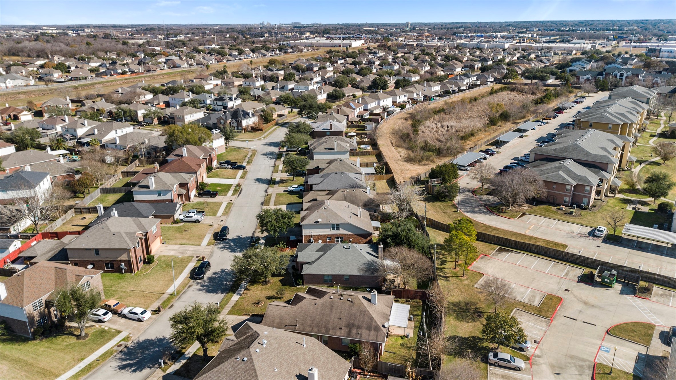 1839 Manor Drive Baytown, TX 77521 - Photo 23 of 26 an aerial view of residential houses with outdoor space