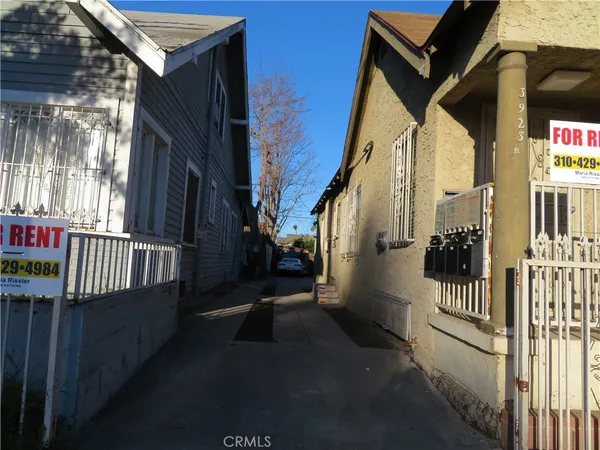 a view of a house with a street