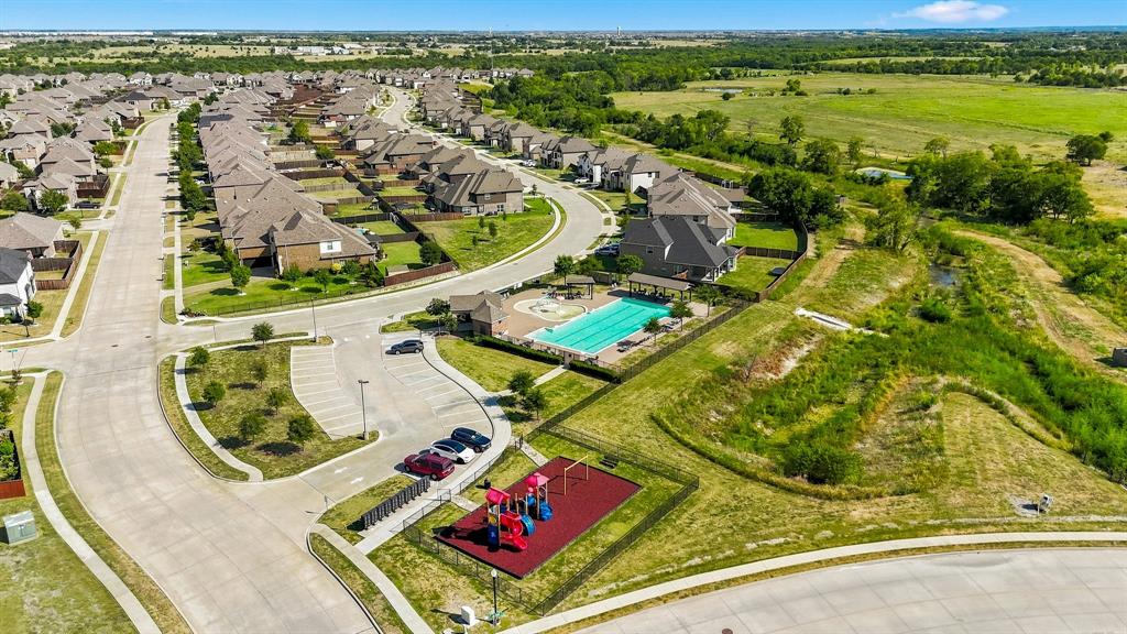 1120 Flamingo Road Forney, TX 75126 - Photo 38 of 40 Community pool and playground.