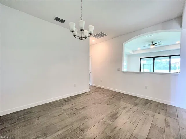 a bathroom with a sink a toilet and bathtub