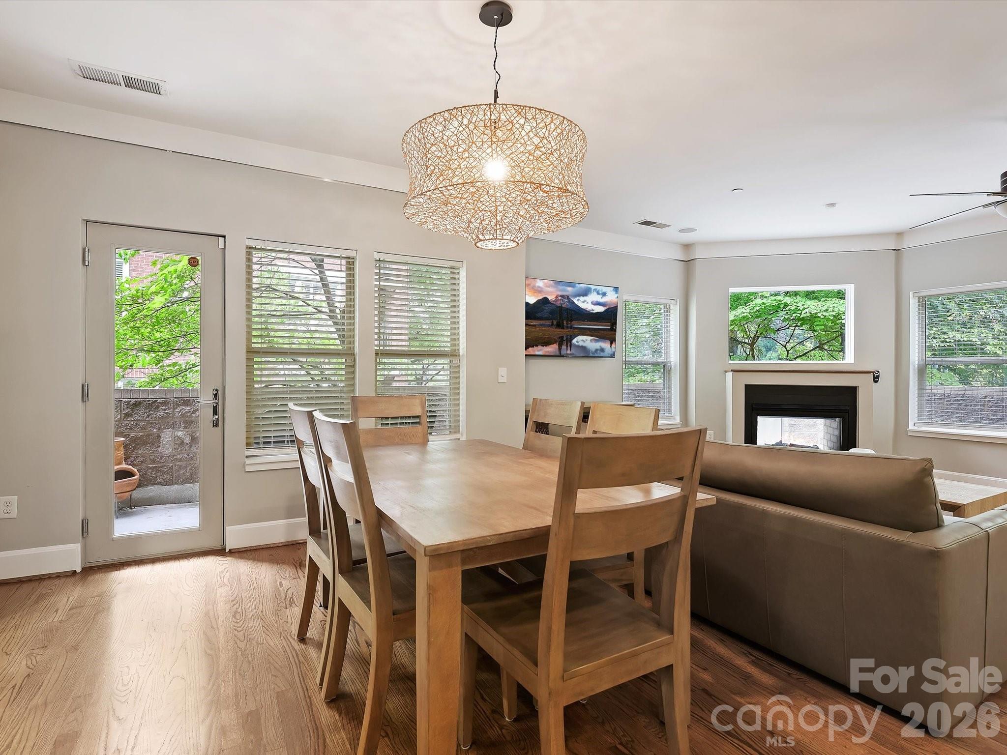 420 Queens Road Charlotte, NC 28207 - Photo 8 of 35 a view of a dining room with furniture window and outside view