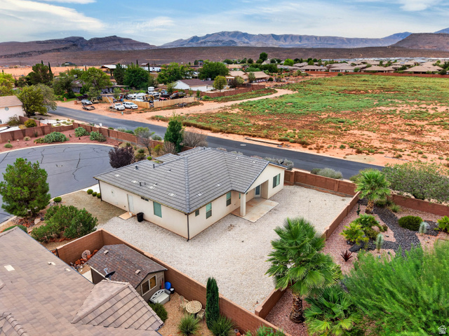 11 East 640 South Ivins, UT 84738 - Photo 4 of 44 Single-story residence with a gray tile roof and stucco exterior