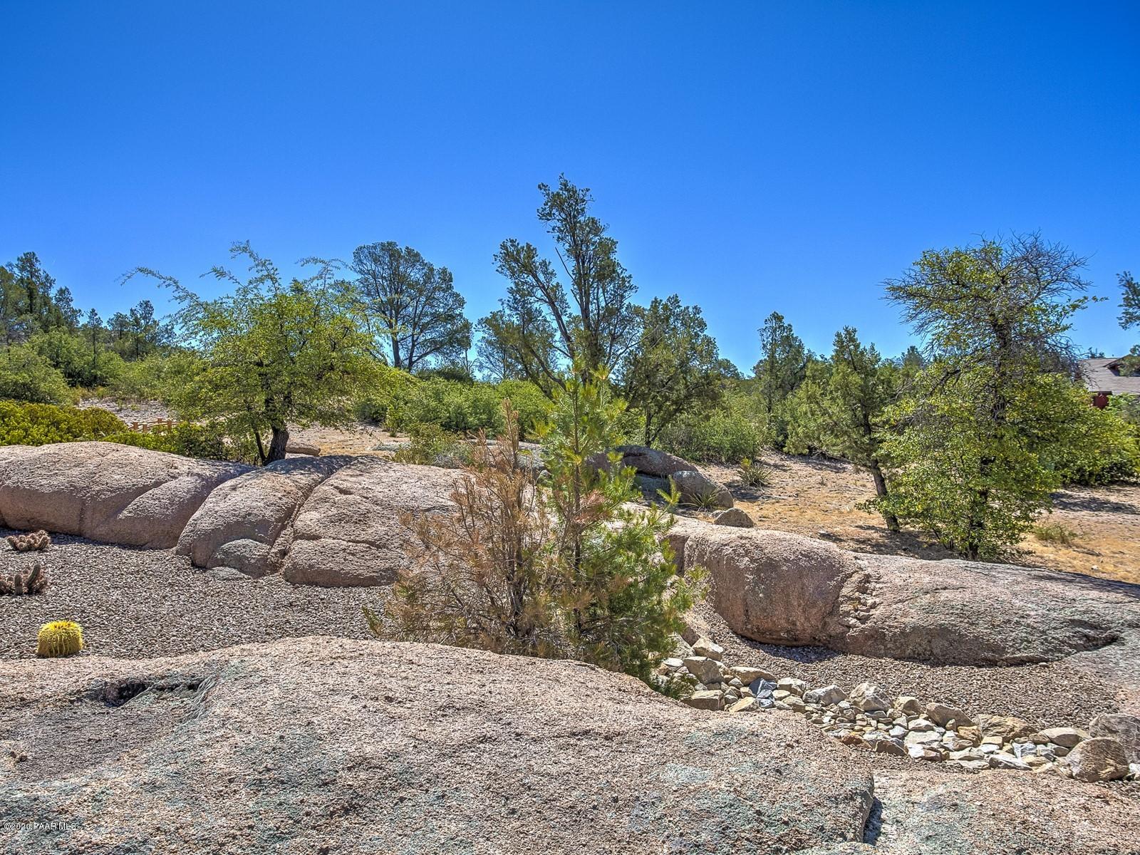 9570 North American Ranch Road Prescott, AZ 86305 - Photo 35 of 51 034_Boulders Everywhere