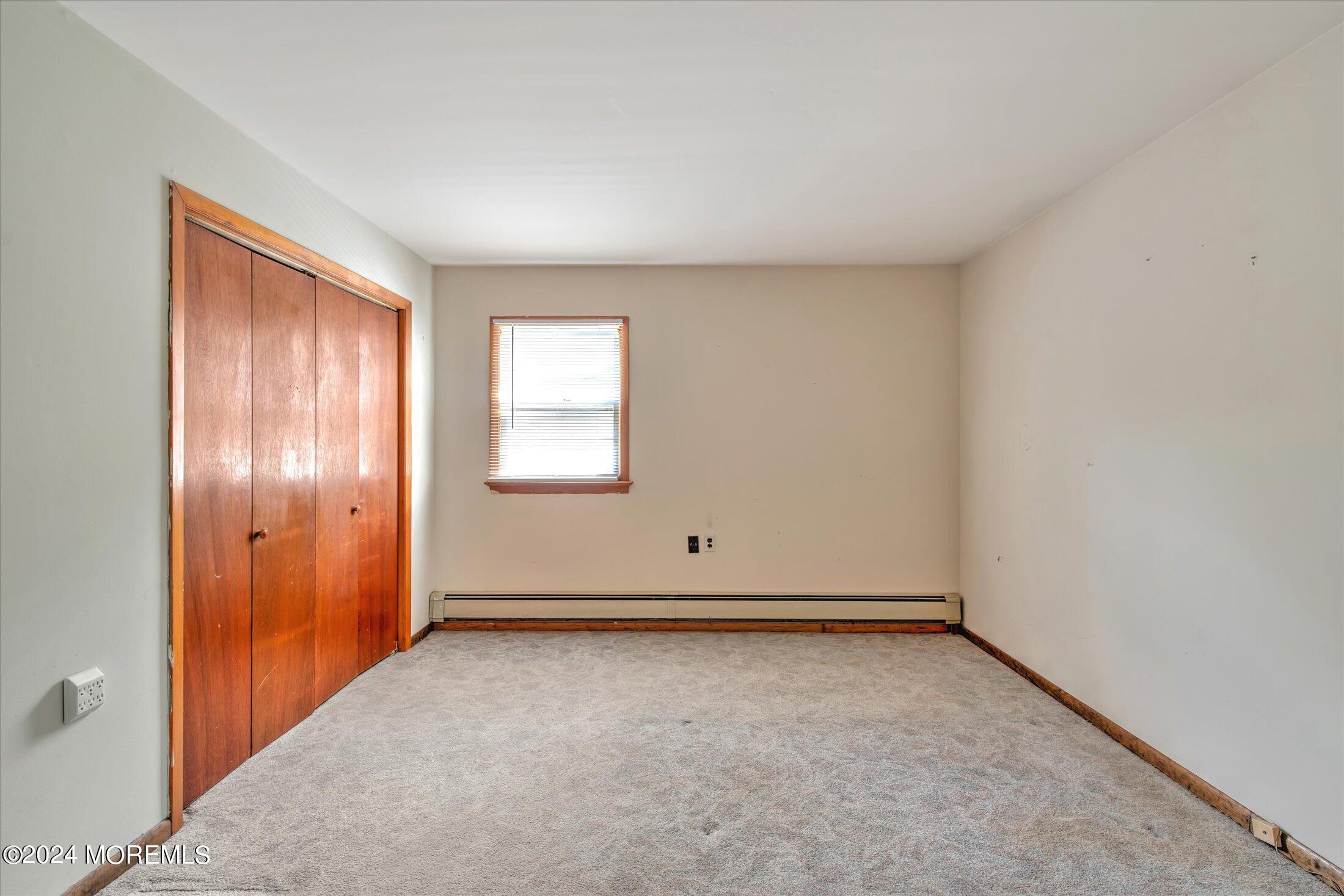2209 Glen Oak Drive Forked River, NJ 08731 - Photo 20 of 44 an empty room with windows