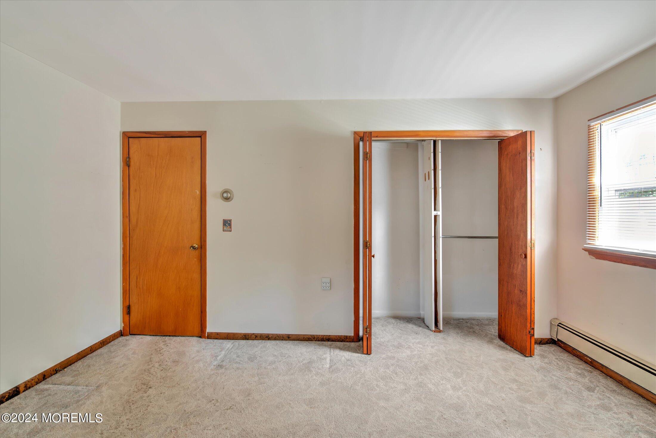 2209 Glen Oak Drive Forked River, NJ 08731 - Photo 22 of 44 an empty room with windows and closet
