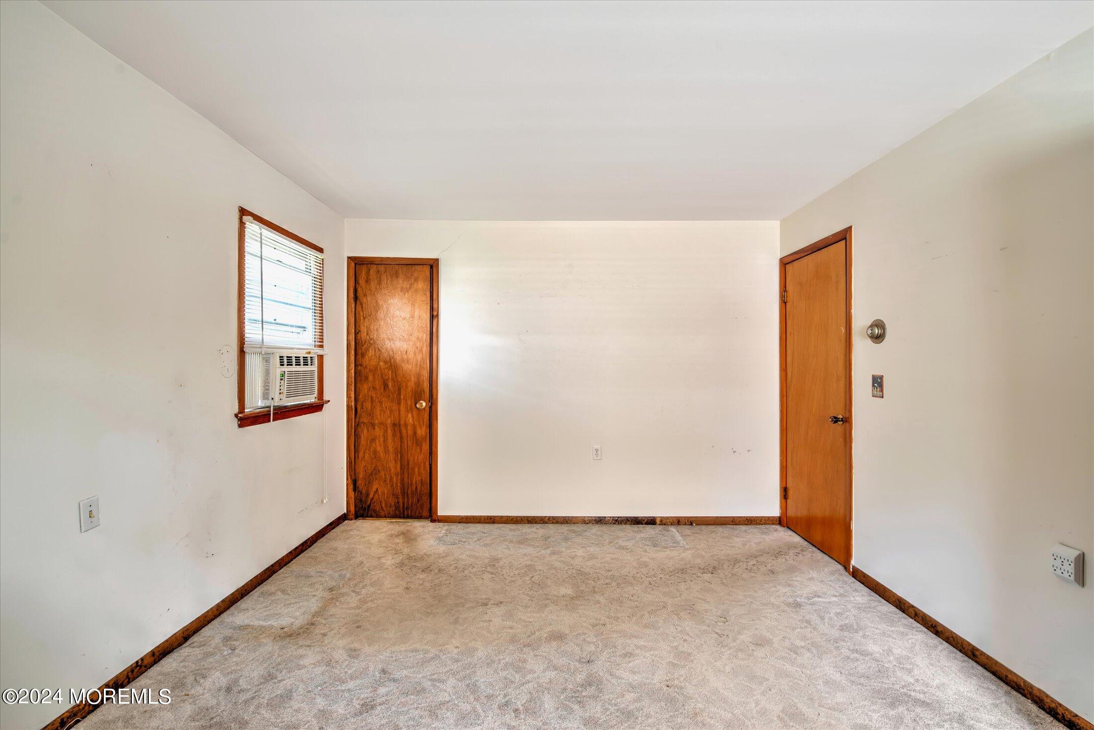2209 Glen Oak Drive Forked River, NJ 08731 - Photo 23 of 44 an empty room with windows and closet