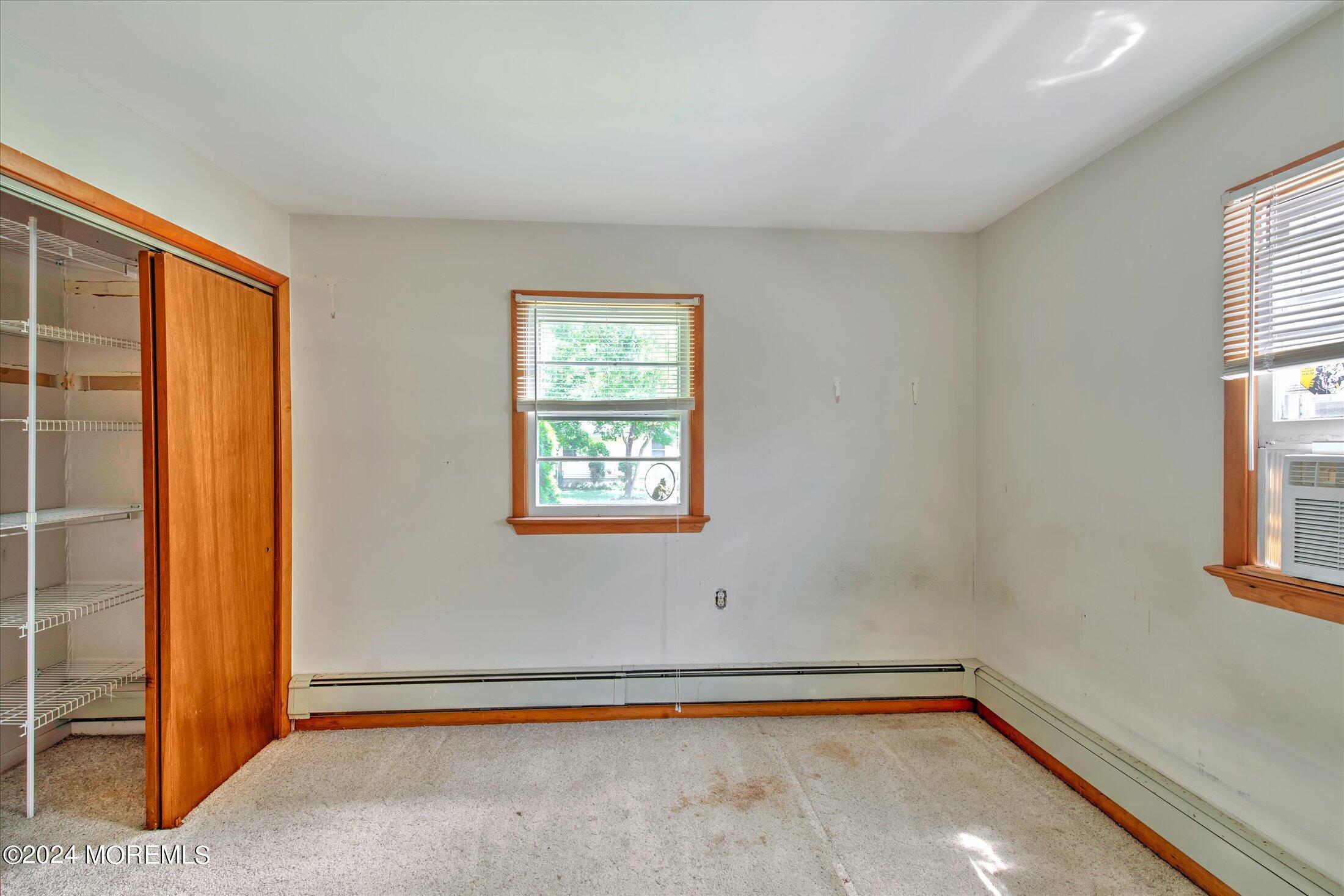 2209 Glen Oak Drive Forked River, NJ 08731 - Photo 27 of 44 an empty room with windows